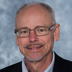 Headshot of professor Roger Dougal