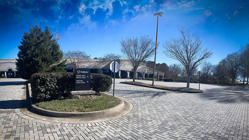 Exterior photo of building and parking lot