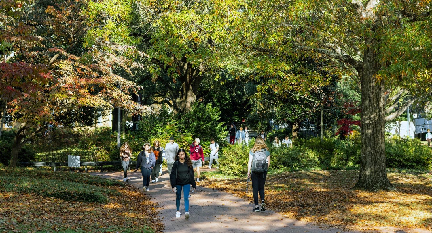 students walk on campus